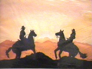 Cowboysunset.jpg (12304 bytes)