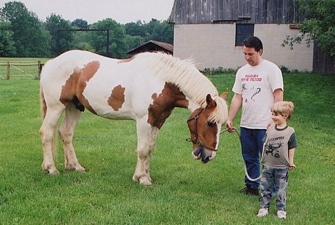 standing in yard with Nick & Andrew.JPG (64430 bytes)